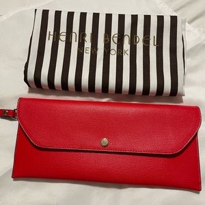 Henri Bendel New York Orange wristlet.
